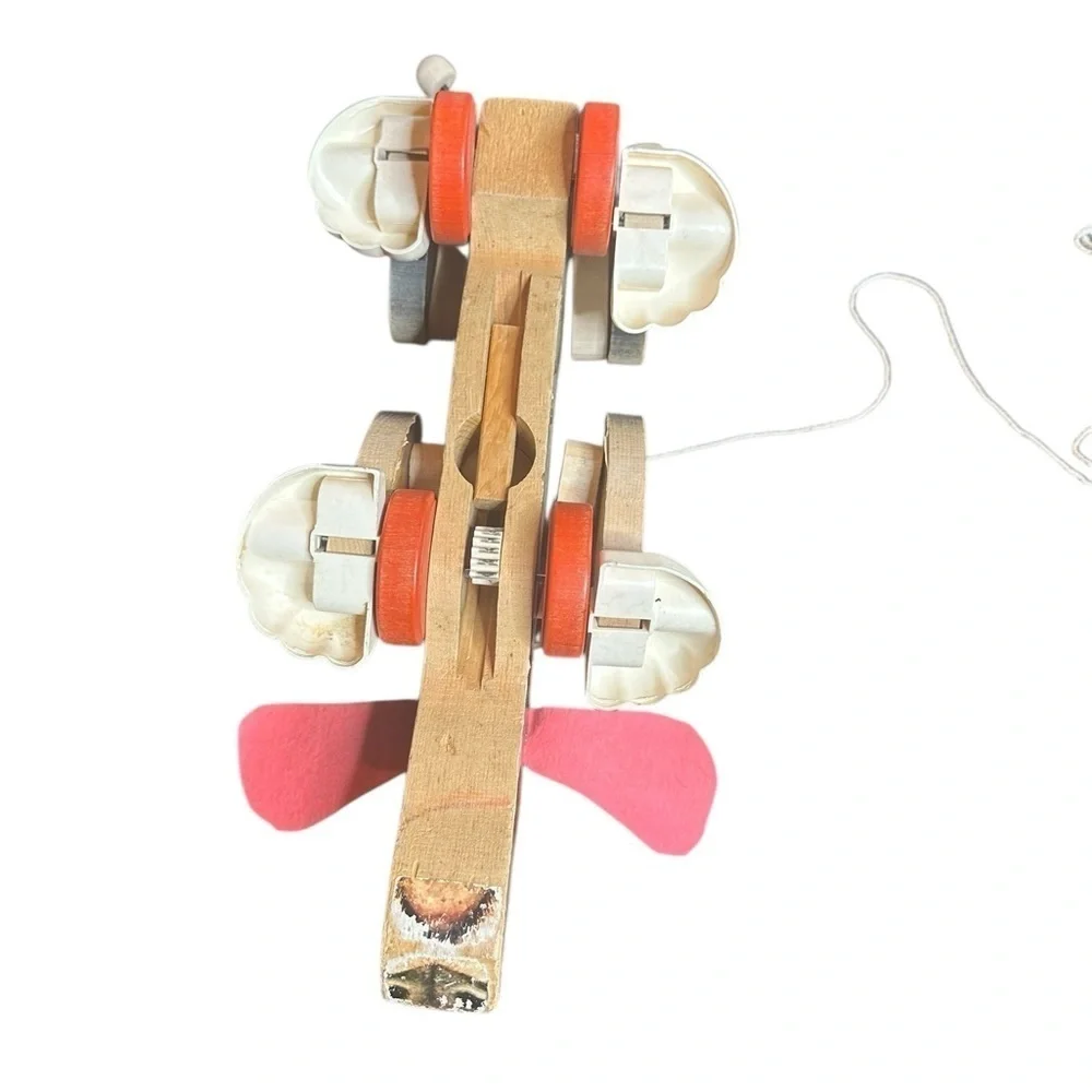 Fisher-Price Snoopy Dog Pull Toy with Red and Black Accents